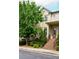 Traditional two-story townhome featuring a covered front entrance and landscaped yard at 1668 Sabastian Ne Pt, Atlanta, GA 30329