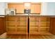 Kitchen island features storage and seating, with shaker cabinets, and stainless appliances at 1668 Sabastian Ne Pt, Atlanta, GA 30329