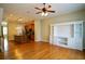 Open concept living area showcasing hardwood floors, updated kitchen, and custom built-ins at 1668 Sabastian Ne Pt, Atlanta, GA 30329
