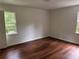 This bedroom is spacious and has newly installed hard wood floors at 2969 Favor Sw Rd, Marietta, GA 30060