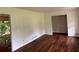 The living room has wood flooring and access to another room at 2969 Favor Sw Rd, Marietta, GA 30060