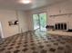 A bright living room with a fireplace and access to the backyard at 2969 Favor Sw Rd, Marietta, GA 30060