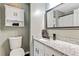 Cozy bathroom featuring granite counters, modern fixtures, and ample storage space at 394 Thornbrooke Dr, Hiram, GA 30141