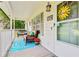 Inviting front porch with comfortable seating, seasonal decorations, and a relaxing outdoor space at 394 Thornbrooke Dr, Hiram, GA 30141