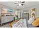 Inviting main bedroom with a comfortable bed, hardwood floors, and serene decor at 394 Thornbrooke Dr, Hiram, GA 30141