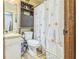 Bathroom includes a toilet, shower, vanity and storage at 480 Pineburr Ln, Stone Mountain, GA 30087
