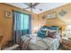 Cozy bedroom with soft carpet, natural light, and soothing blue accents at 480 Pineburr Ln, Stone Mountain, GA 30087