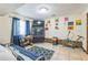 Versatile bonus room with carpet and tv, ideal for , hobbies, or a home office at 480 Pineburr Ln, Stone Mountain, GA 30087