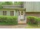 Charming front entrance with decorative wreath, homey décor, and well-kept front lawn at 480 Pineburr Ln, Stone Mountain, GA 30087