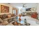 Spacious living room with a brick fireplace, built-in shelving, and comfortable seating, creating a cozy atmosphere at 480 Pineburr Ln, Stone Mountain, GA 30087