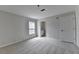Bedroom featuring neutral colored walls, carpet, and double door closet at 525 Hunnicutt Se Rd, Mableton, GA 30126