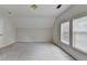 Cozy bedroom featuring plush carpet, natural light, and a neutral color palette at 525 Hunnicutt Se Rd, Mableton, GA 30126