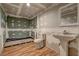 Unfinished bathroom features wood look floors, a toilet, and a sink at 165 Country Mill Ln, Stockbridge, GA 30281