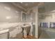 Another angle of unfinished bathroom featuring wood look floors, a toilet, and a sink at 165 Country Mill Ln, Stockbridge, GA 30281