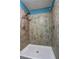 Shower featuring dual shower heads and stylish tile at 165 Country Mill Ln, Stockbridge, GA 30281