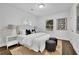 Comfortable bedroom featuring a plush bed with stylish pillows and decor art at 2222 Beecher Sw Cir, Atlanta, GA 30311