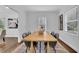 Cozy dining room with a wood table, seating for six, and natural light at 2222 Beecher Sw Cir, Atlanta, GA 30311