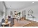 Bright living room with modern furniture, stylish decor, and hardwood floors, offering a comfortable and inviting space at 2222 Beecher Sw Cir, Atlanta, GA 30311
