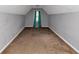 Bedroom featuring neutral walls, carpet flooring, natural light, and curtains at 6744 Rockbridge Rd, Stone Mountain, GA 30087