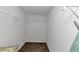 Walk in closet with white walls and shelving at 6744 Rockbridge Rd, Stone Mountain, GA 30087