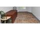 Room featuring tile floors and dark wood desk with matching chairs at 6744 Rockbridge Rd, Stone Mountain, GA 30087