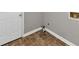 Room featuring tile floors and a white door at 6744 Rockbridge Rd, Stone Mountain, GA 30087