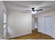 This bedroom has neutral walls, a ceiling fan and hardwood floors at 2543 Asbury Court Ct, Decatur, GA 30033