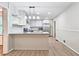 Updated kitchen with granite counters, stainless steel appliances, and subway tile backsplash at 2543 Asbury Court Ct, Decatur, GA 30033