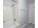 This shower stall features a white tile surround and silver fixtures at 2543 Asbury Court Ct, Decatur, GA 30033