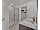 Contemporary bathroom with glass shower, double sinks, and modern fixtures at 2766 Aralynn Way, College Park, GA 30337