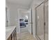 Bathroom with shower, dual sink and adjacent bedroom at 2766 Aralynn Way, College Park, GA 30337