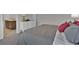 Comfortable bedroom with adjacent bathroom, neutral tones and plush bedding at 2766 Aralynn Way, College Park, GA 30337