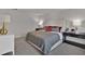 Cozy bedroom with soft carpet, a padded headboard and stylish furniture at 2766 Aralynn Way, College Park, GA 30337