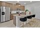 Modern kitchen features stainless steel appliances, granite countertops, and a spacious island with bar stool seating at 2766 Aralynn Way, College Park, GA 30337