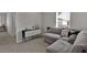 Comfortable living room features neutral walls, plush sofa, and abundant natural light from window at 2766 Aralynn Way, College Park, GA 30337