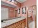 Bathroom featuring granite countertops and decorative mirrors at 3232 Valaire Drive Dr, Decatur, GA 30033