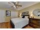 A charming bedroom showcasing hardwood floors, and a large window providing ample light at 3232 Valaire Drive Dr, Decatur, GA 30033