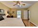 Comfortable bedroom with hardwood floors, a ceiling fan, and bright natural light at 3232 Valaire Drive Dr, Decatur, GA 30033