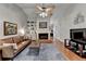 Spacious living room features a fireplace, built-in shelving, and hardwood floors at 3232 Valaire Drive Dr, Decatur, GA 30033