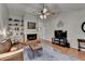 Spacious living room features a fireplace, built-in shelving, and hardwood floors at 3232 Valaire Drive Dr, Decatur, GA 30033