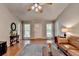 Bright living room showcasing gleaming hardwood floors and neutral paint at 3232 Valaire Drive Dr, Decatur, GA 30033