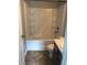 Bathroom featuring a tub/shower combination with tiled walls and modern fixtures at 8430 Carlington Ln, Jonesboro, GA 30236
