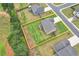 An aerial view shows the lot lines of the property, showcasing its location in a green neighborhood at 109 Jodi Pl, Locust Grove, GA 30248