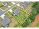 Aerial shot of the home highlighting a spacious fenced backyard and well-manicured landscaping at 109 Jodi Pl, Locust Grove, GA 30248