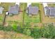 Aerial view of a fenced yard and a two-story house with gray shingles at 109 Jodi Pl, Locust Grove, GA 30248