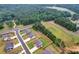 An aerial view highlights this home's location within a lush, green community at 109 Jodi Pl, Locust Grove, GA 30248
