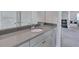 Modern bathroom vanity with gray cabinets and a gray countertop and a full mirror at 109 Jodi Pl, Locust Grove, GA 30248