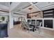 Spacious dining area showcasing designer lighting, stylish decor, and an open layout connecting to the living spaces at 109 Jodi Pl, Locust Grove, GA 30248