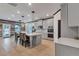 Open kitchen featuring a center island with seating and modern stainless-steel appliances at 109 Jodi Pl, Locust Grove, GA 30248