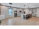 Contemporary kitchen boasting an island, ample cabinet space, stainless steel appliances, and an open layout for socializing at 109 Jodi Pl, Locust Grove, GA 30248